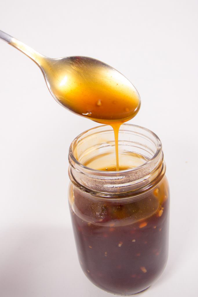 Easy Homemade Teriyaki Sauce Recipe dripping from spoon