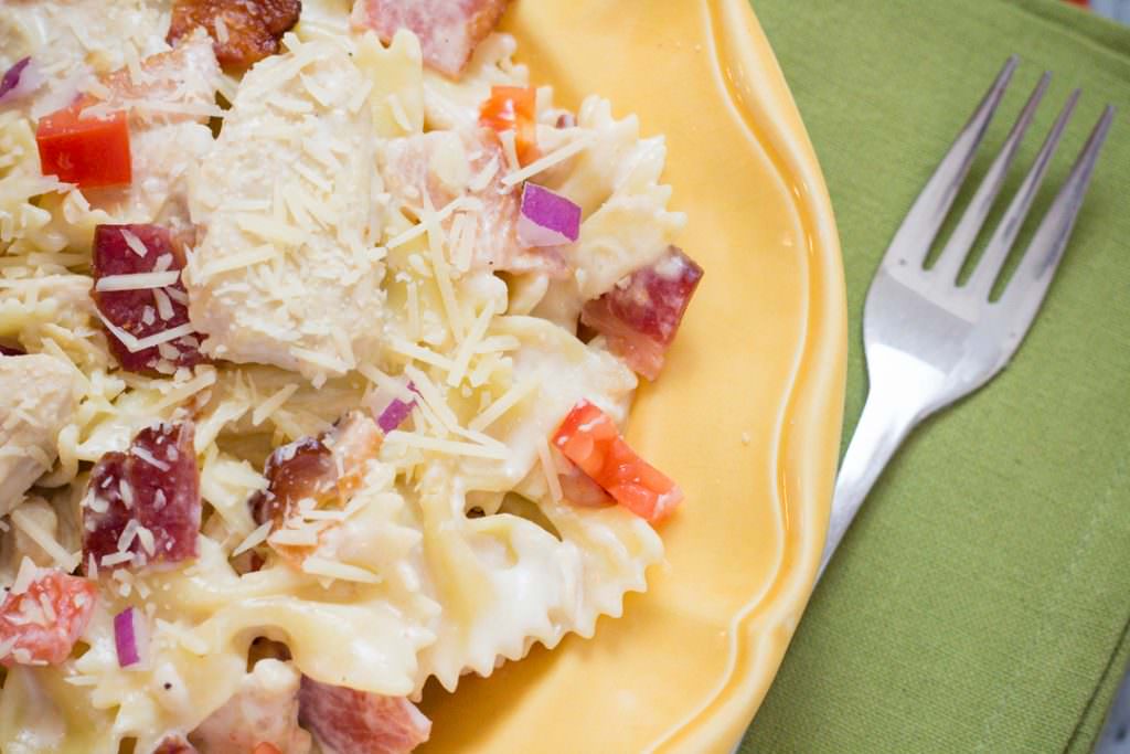 Bowtie Festival, Chicken Carbonara in Alfredo Sauce with Chicken, Bacon, Red Onion and Tomatoes