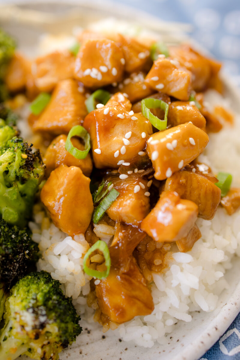 Sticky Honey Garlic Chicken on plate with rice and broccoli