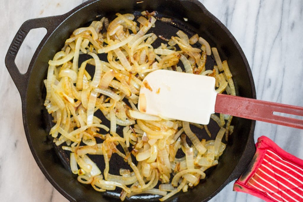 Saute Onions in Cast Iron Pan over Medium High Heat for Bacon Onion Appetizer Recipe Small Bite Party Foods