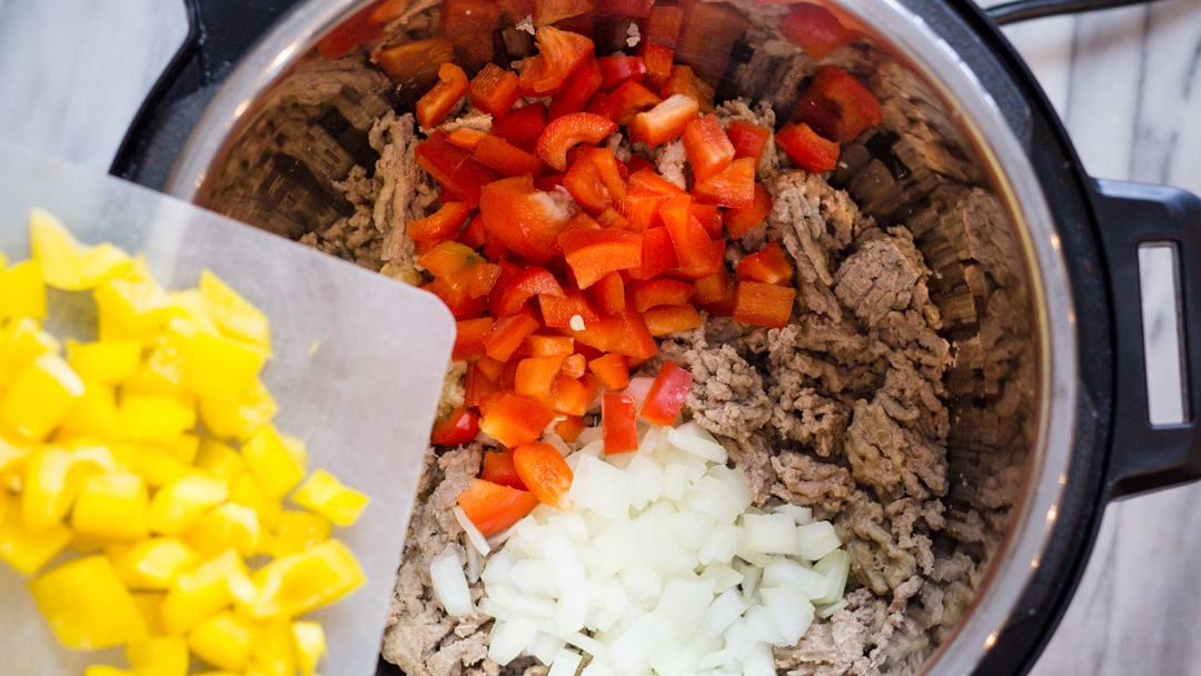 Who doesn't love a good Taco in their hand? Ground Turkey Tacos are Keto Friendly, Gluten Free and perfect for Taco Tuesday. Instant Pot recipe makes this a perfect recipe for any night of the week with fresh bell peppers, limes, cilantro, tomatoes and more this recipe is a healthy feel good recipe to enjoy. #tacotuesday #taco #groundturkeytaco #groundturkey #glutenfree #keto #ketofriendly #dinner #dinnerrecipe #easyrecipe #food #foodie #recipe #recipes #instantpot #instantpotrecipe #yum