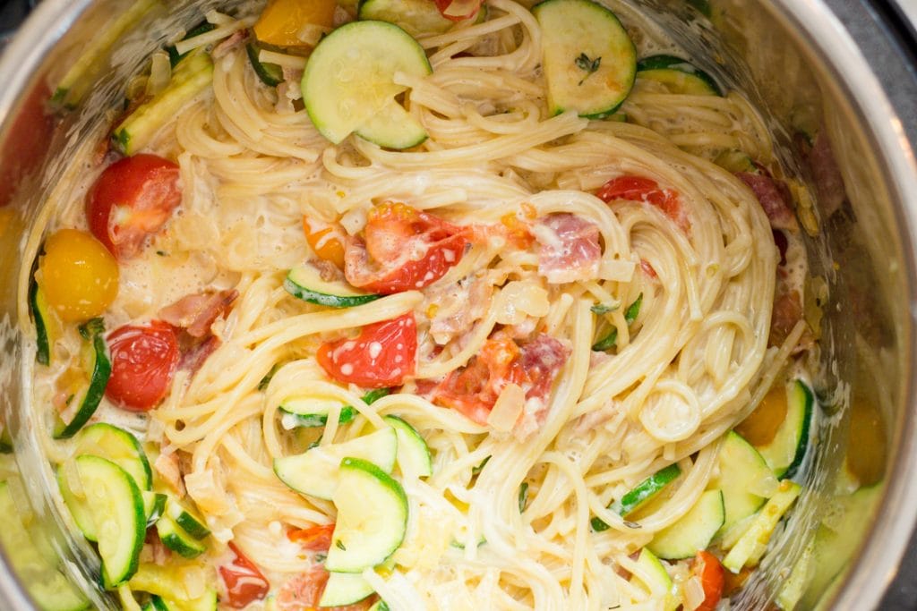 Stir in Vegetables into Instant Pot with Pasta