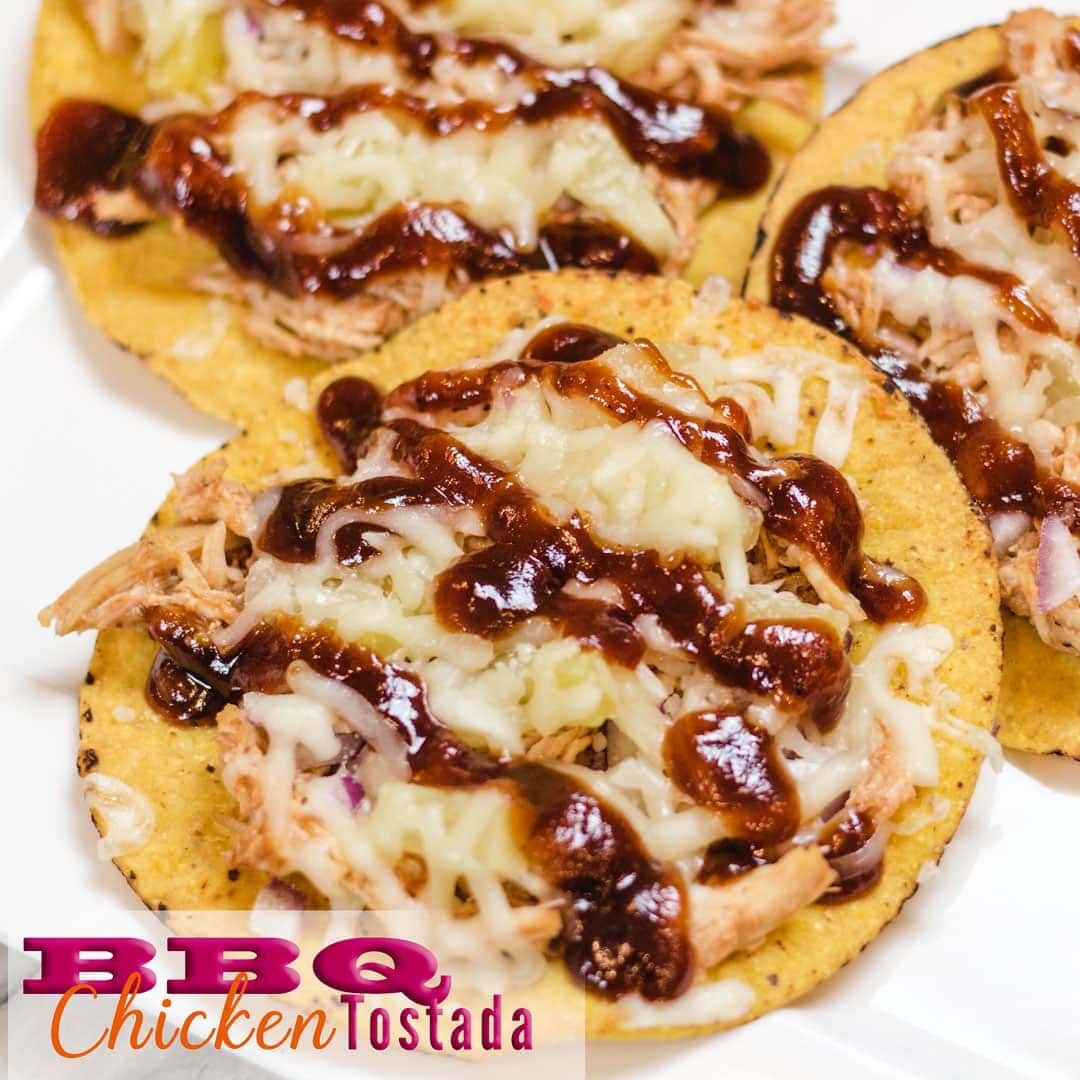 BBQ Chicken Tostada with melted cheese, pineapple, and red onion