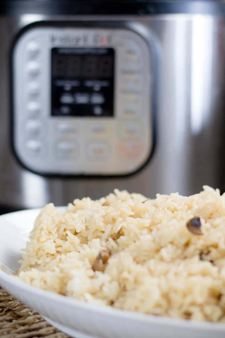 Mushroom Garlic Rice Pilaf is a perfect side dish with any meal. Making Mushroom Garlic Rice in the Pressure Cooker is super simple and a family favorite. And they taste great! #devourdinner #easyrecipe #Instantpot #instantpotrecipe #easysidedish #sidedish #recipe #recipes #food #foodie #rice #mushroom #yum #kidapproved #4minrecipe #Pressurecooker #easysidedishrecipe #instagood #foodiefriday #familyfriendly #easyrecipe #easyinstantpotrecipe
