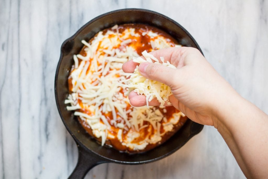 Mozzarella Cheese on Easy Pizza Dip in Cast Iron Pan