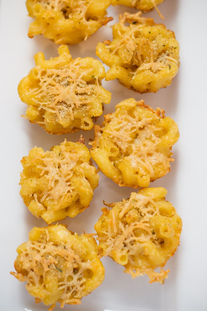 We have a favorite after school snack! Mac and Cheese Cups are wonderful. These little cups pop in your mouth and taste just like Grandma’s Homemade Mac and Cheese. Made in the Pressure Cooker and then Baked for the crispy outside. #yum #devourdinner #easyrecipe #Macandcheese #macaroniandcheese #appetizer #appetizerrecipe #instantpot #instantpotrecipe #pressurecooker #sidedish #kidfriendly #familyapproved #gamenight #cheese #recipe #recipes #yum #yummy