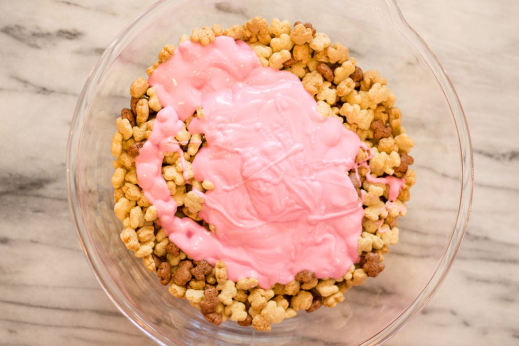 Melted Candy Wafter on Cereal for Muddy Buddies Bunny Chow Snack Mix