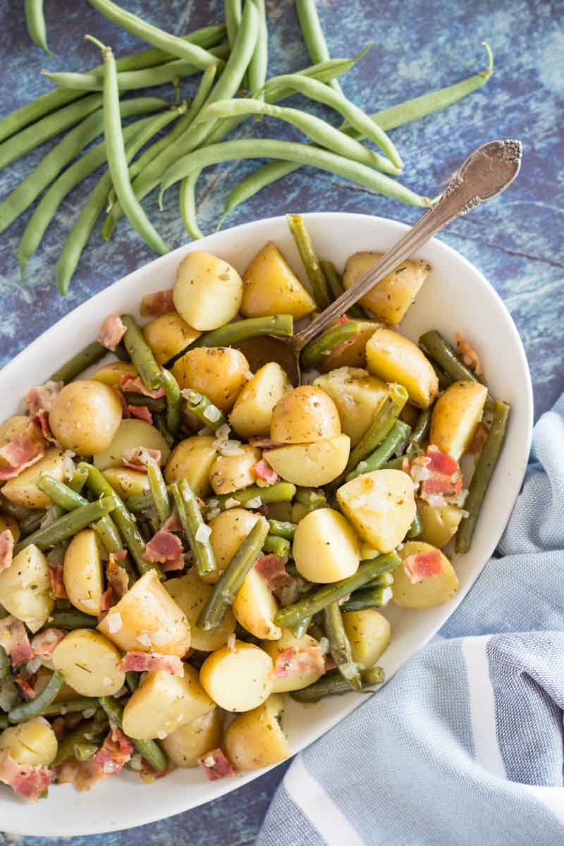 You can spruce up dinner time with this fresh green beans and herbed potatoes side dish. It’s a flavorful way to bring veggies to the table by combining garlic, potatoes, and bacon together, you’re sure to have a new family favorite. The best part is that it doesn’t take very long to assemble or cook. #devourdinner #easyrecipe #easysidedish #sidedishrecipe #foodie #food #recipe #recipes #bacon #potatoes #greenbeans #instantpot #easyinstantpotrecipe #instantpotsideidsh #Thanksgivingrecipe #yum