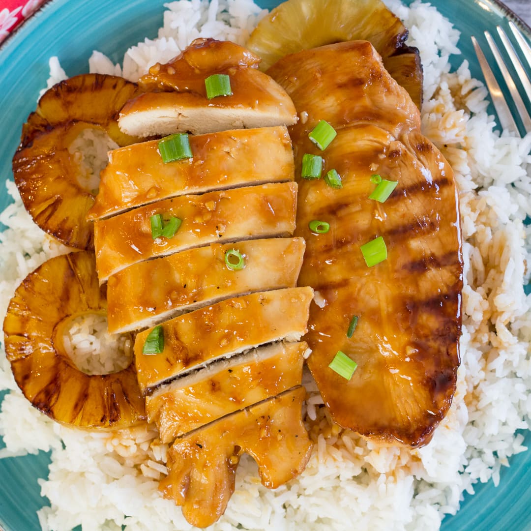 Huli Huli Chicken served on a bed of rice.