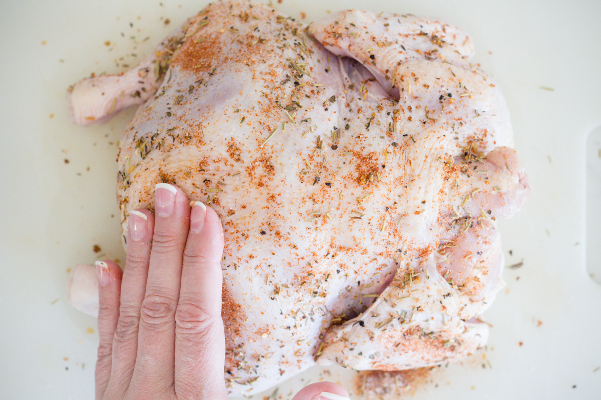 Rub chicken with seasonings