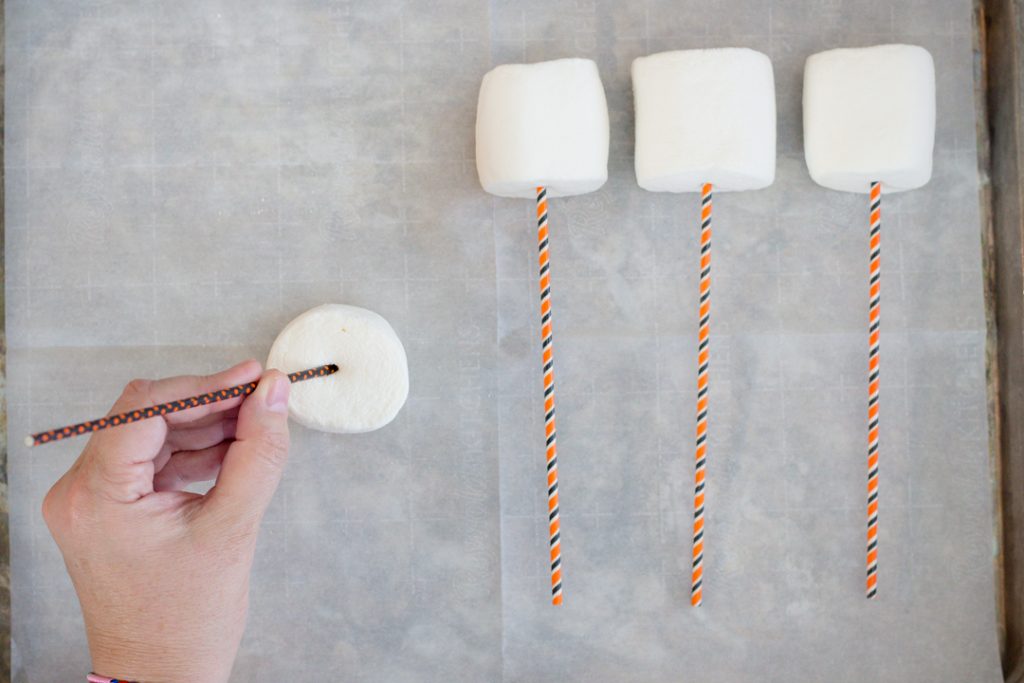 Poke Holes in Marshmallows with Sticks