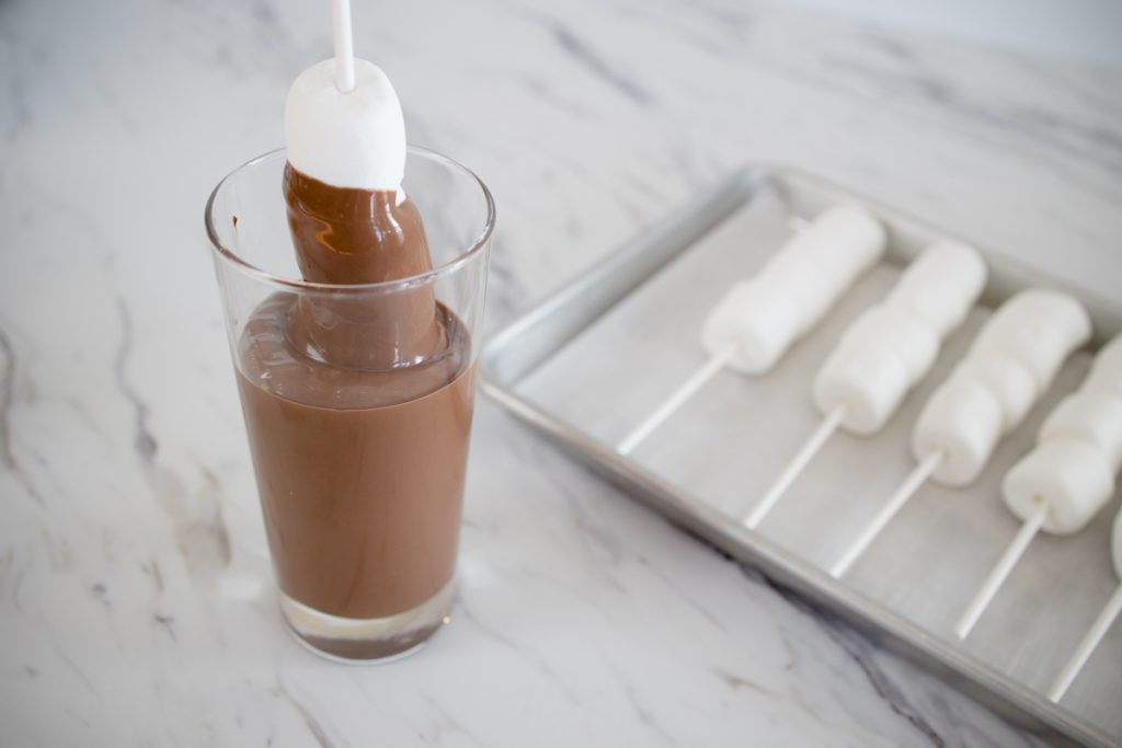 Dipping Marshmallow Pops in Chocolate