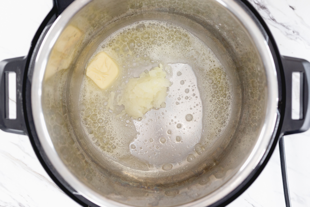 Butter and grated onion in Instant Pot