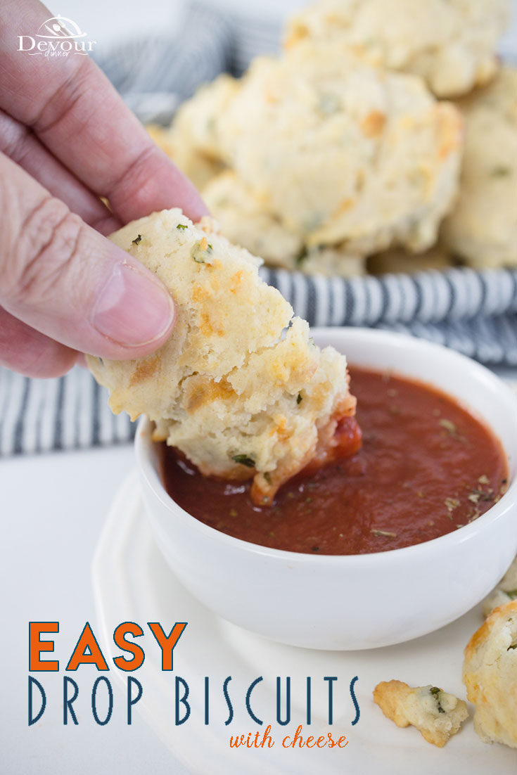 Drop Biscuits are a super simple recipe perfect to serve with dinner. Made with Flour, Baking Powder, Salt, Cheese, Herbs, Garlic, Milk & Oil. These Mountain Biscuits are easy to make and enjoy with any meal or serve with Marinara Sauce and dip. It's delicious. #devourdinner #devourpower #whatsfordinner #dropbiscuit #easydropbiscuits #mountainbiscuits #familyrecipes #breadrecipe #homebaked #ilovebaking #bakingtherapy #bakersofinstagram #bakinglove #thebakefeed #yum #yummy