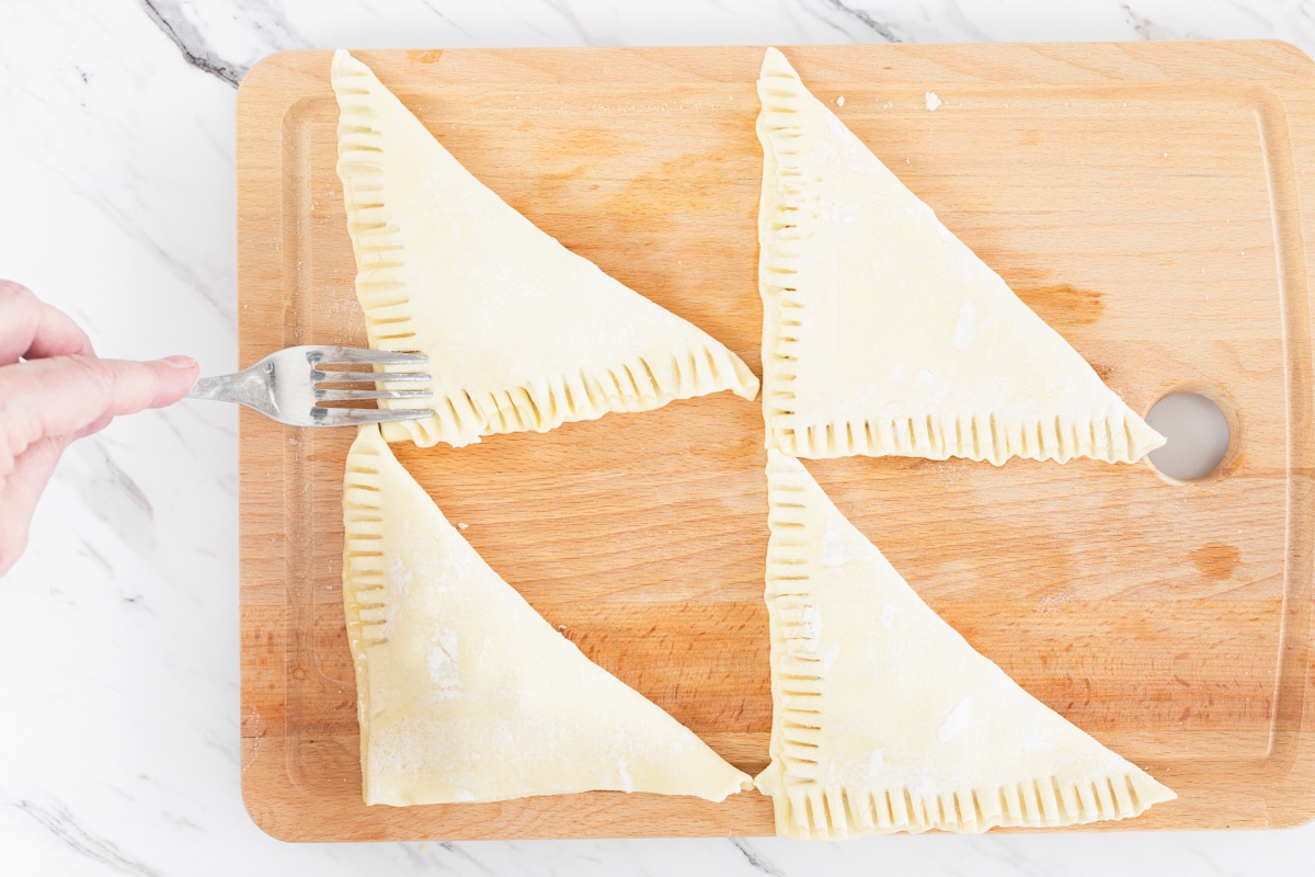 Crimping edges of puff pastry using fork