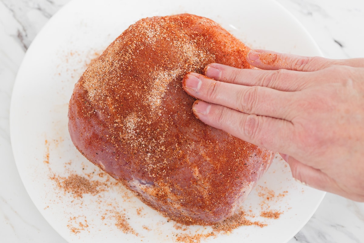 Rub Pork Roast with Seasonings