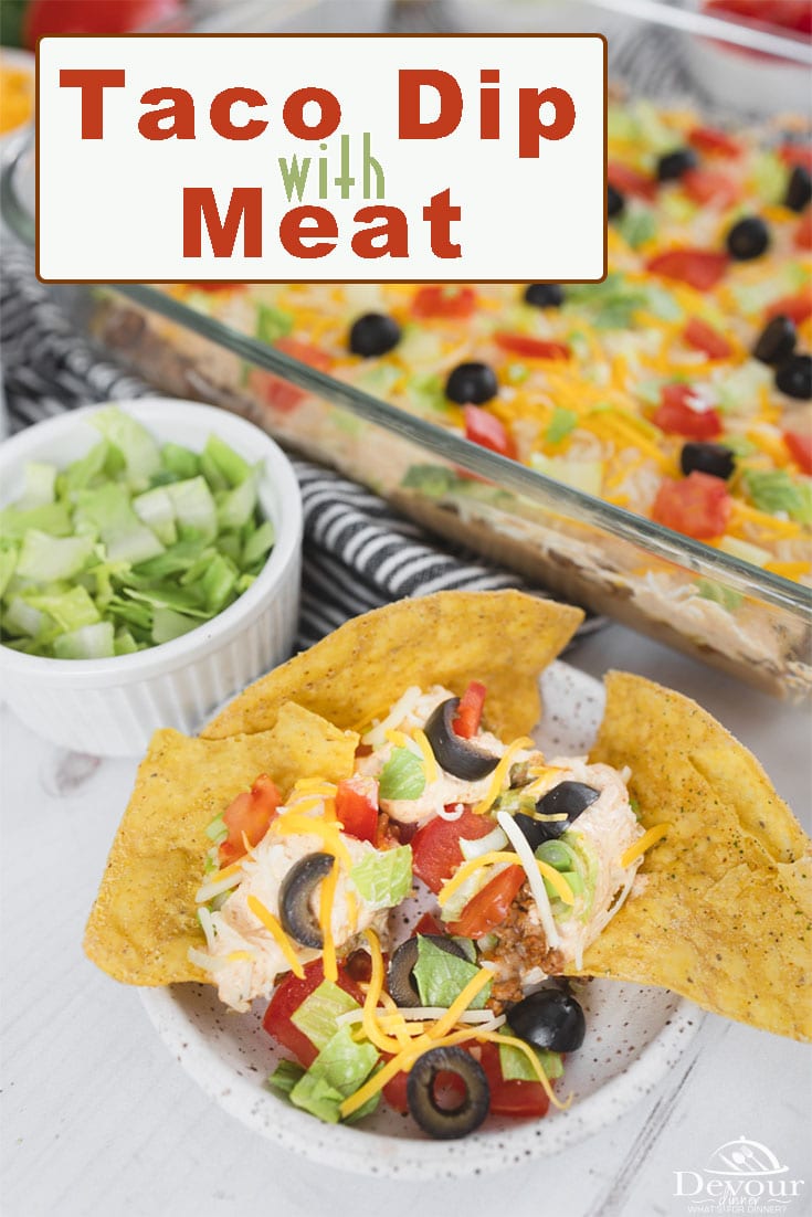 Taco Dip with Meat is a Seven Layer Tip served Hot or Cold with an added layer of Taco Ground Beef. Add refried Beans, Cheese, Olives, Green Onions, Diced Tomatoes, Avocado, Salsa, Guacamole. Serve with Chips for a delicious appetizer recipe or meal. #devourdinner #devourpower #tacodip #tacodipwithmeat #appetizerrecipe #easydinnerrecipe #delish #yum #yummy #groundbeef #