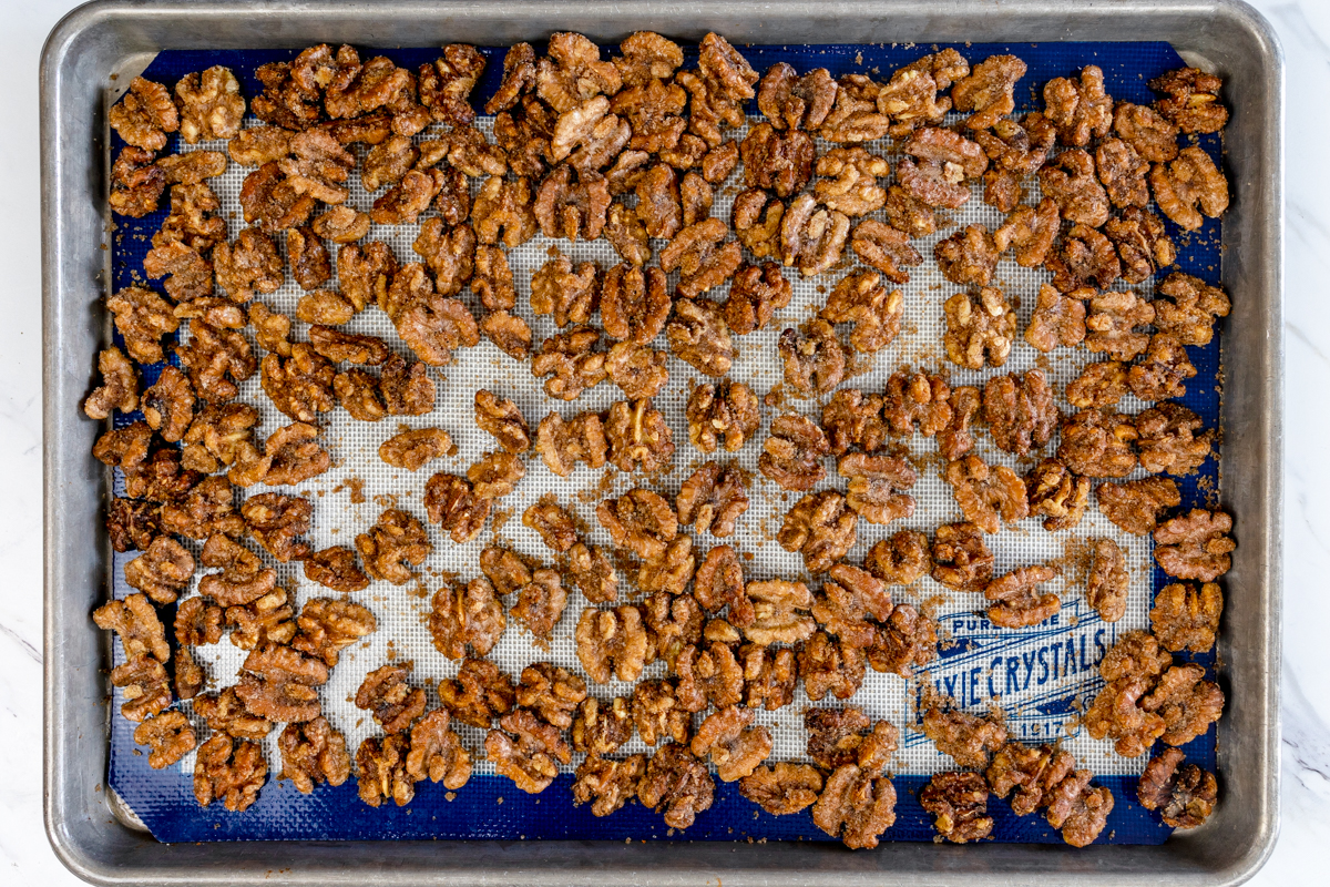 Air Fryer Candied Walnuts on baking sheet cooling