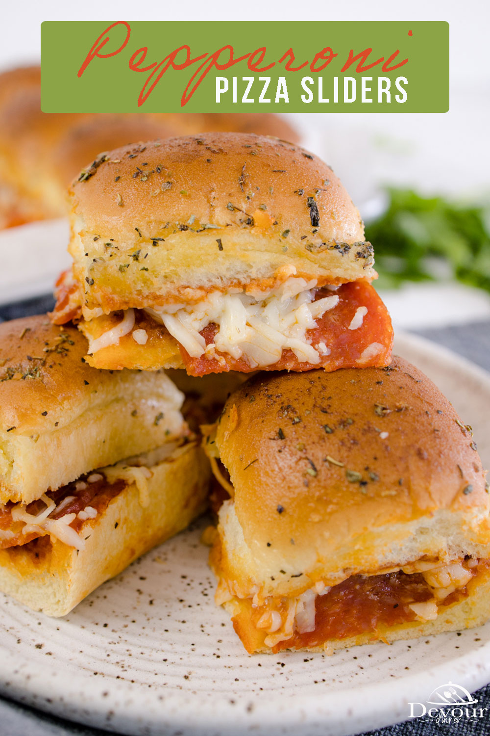 Hot from the oven, these pepperoni Pizza Sliders are a delicious twist on a classic pizza and a favorite slider recipe. These super soft rolls are loaded with marinara sauce, melted cheese, and slices of pepperoni, and are topped with Italian garlic butter.
