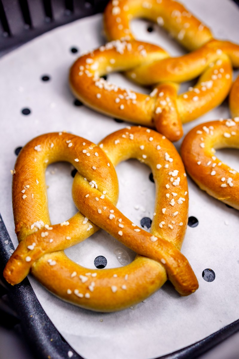 Air-fried pretzels ready to be removed from the air fryer.