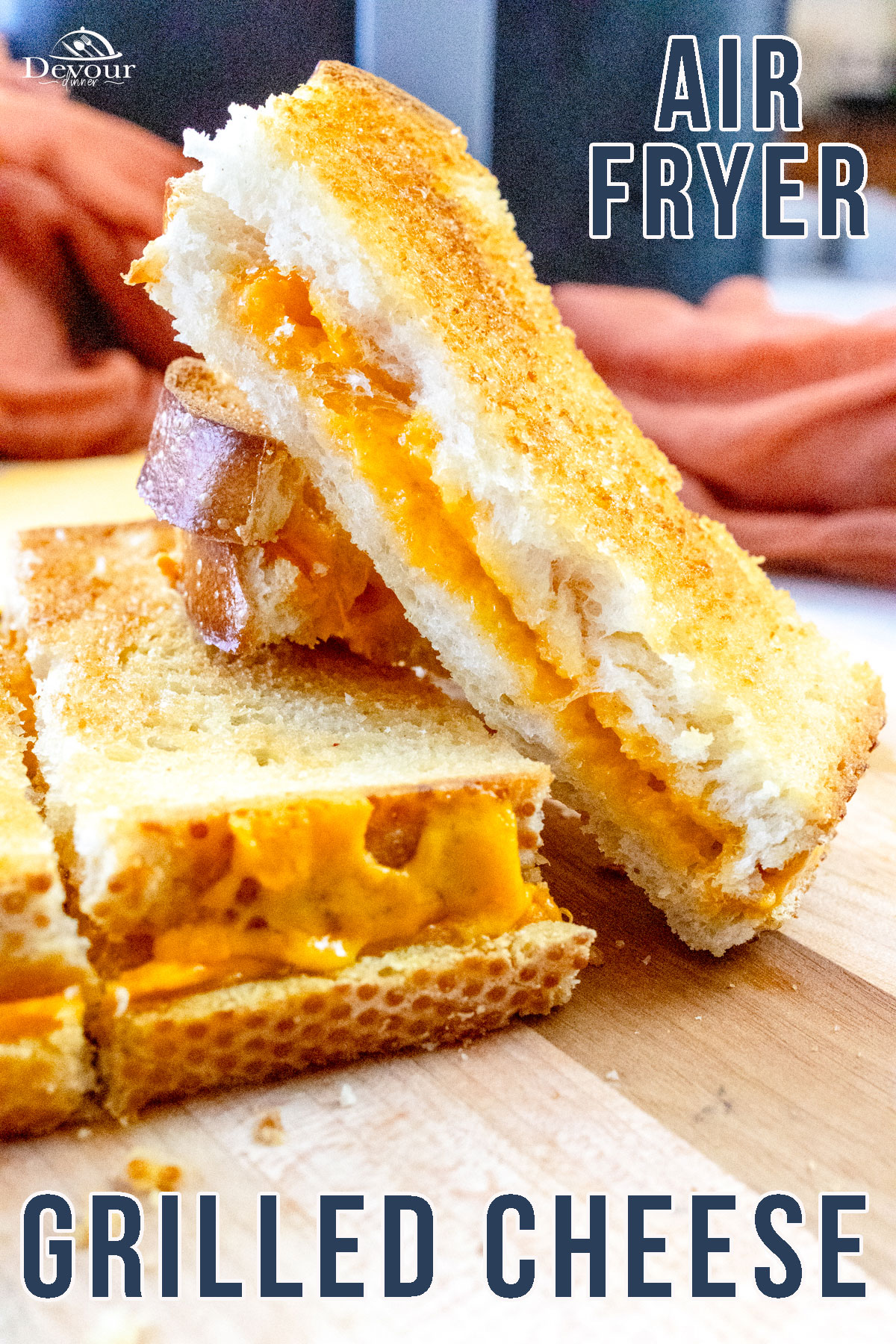 These perfectly toasted Air Fryer Grilled Cheese Sandwiches are crisp on the outside and super gooey on the inside! Coated in butter and packed with yummy cheese, they're great for brunch, lunch, or a light dinner!