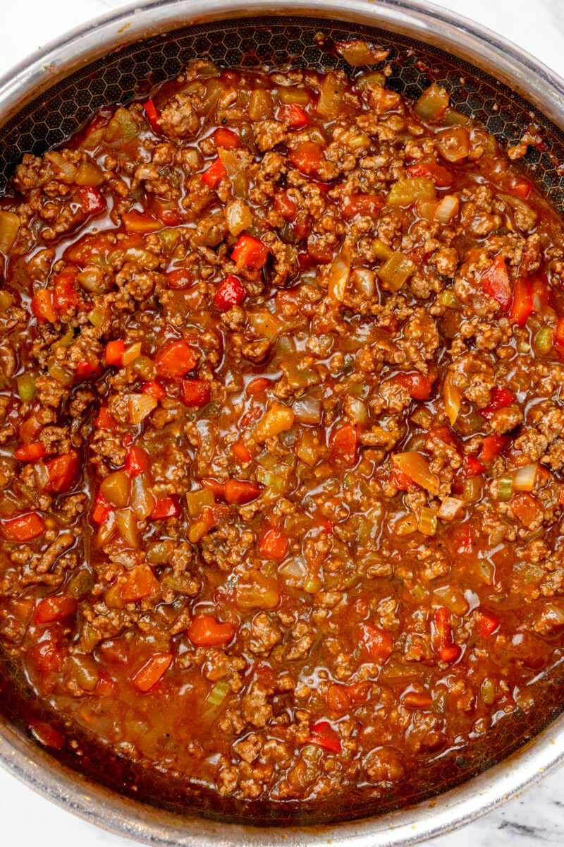 Top view of pan with sloppy joe mixture ready to be poured into casserole dish.