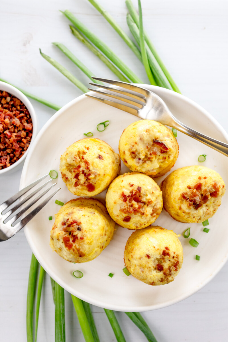 Overhead shot of Air Fryer Egg Bites on a white plate.