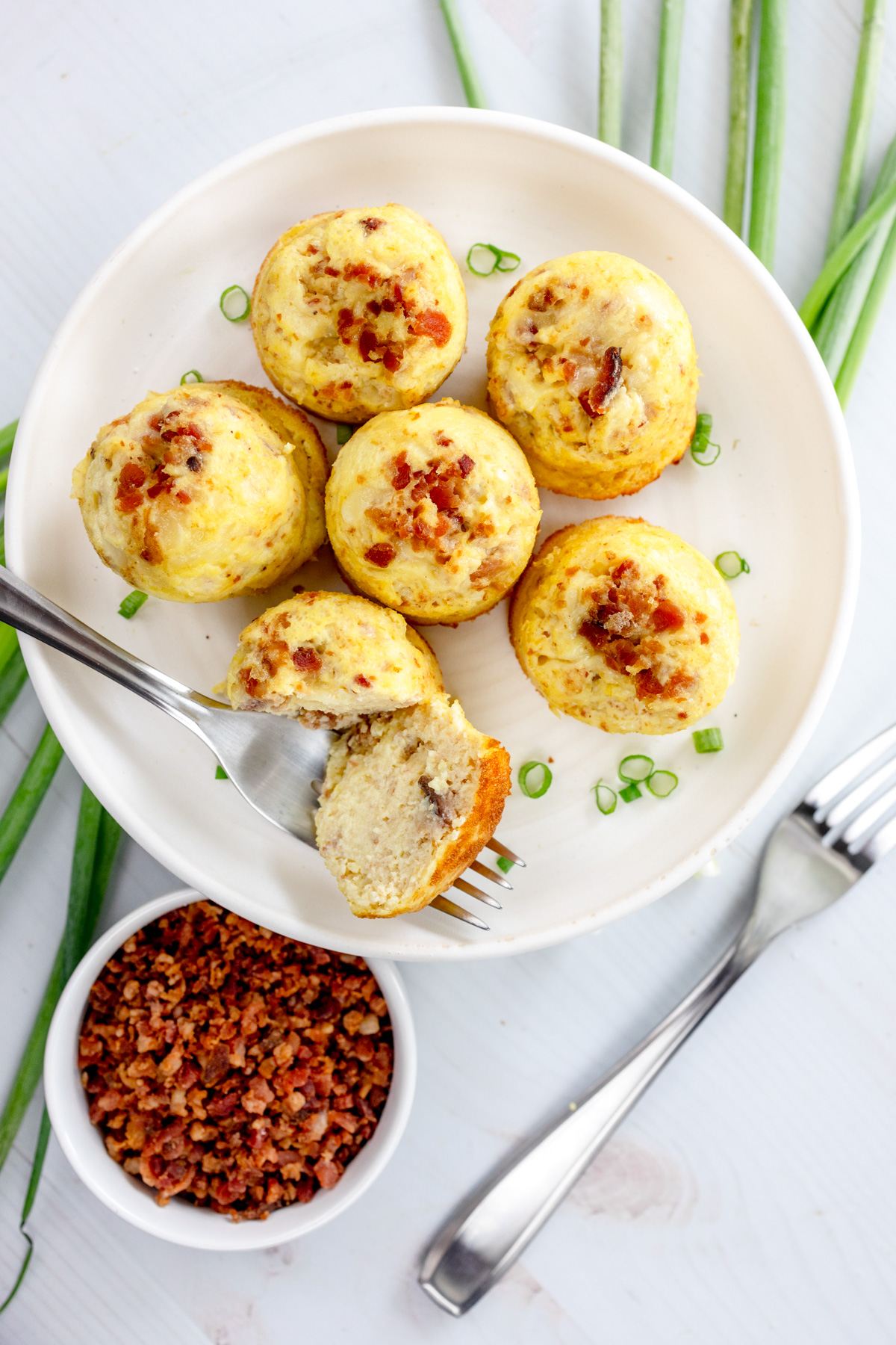 Overhead shot of Air Fryer Egg Bites on a white plate.
