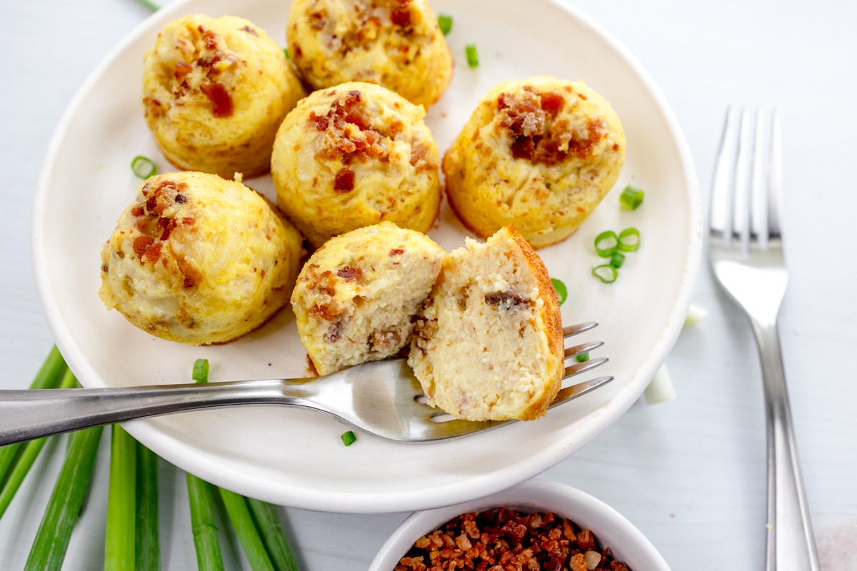 Close up shot of Air Fryer Egg Bites on a white plate.
