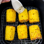 Square image of Air Fryer Frozen Corn on the Cob.
