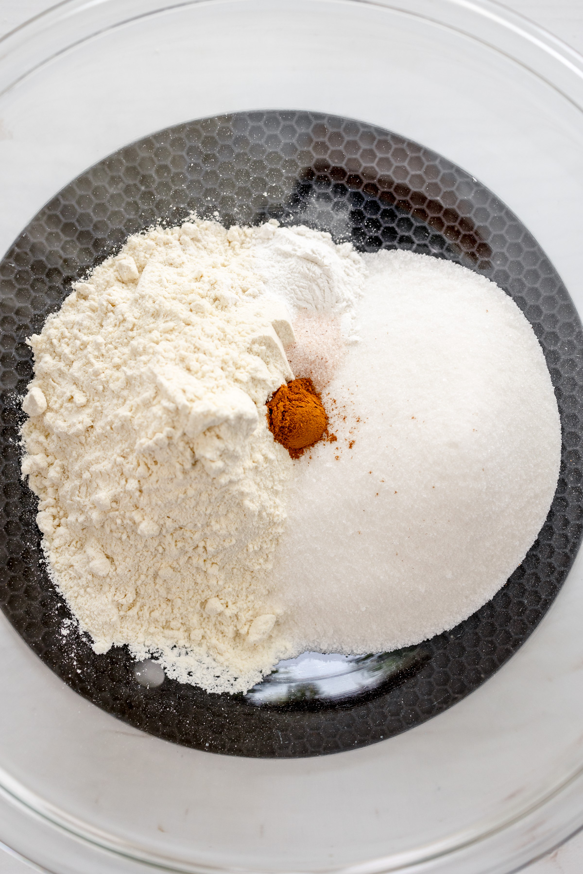 Overhead image of dry ingredients needed to make Blueberry Peach Muffins.