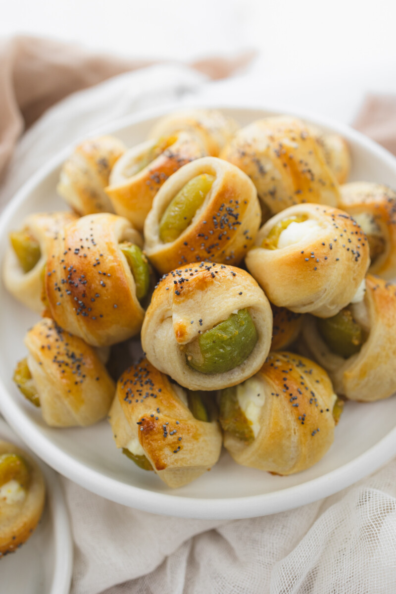 Overhead image of Figs in a Blanket on a white plate.