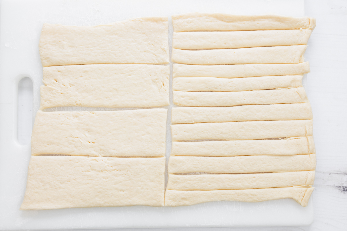 Overhead image of pastry sliced into strips.