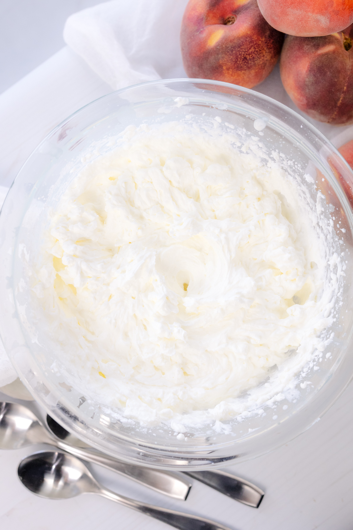 Overhead view of a bowl of whipping cream.