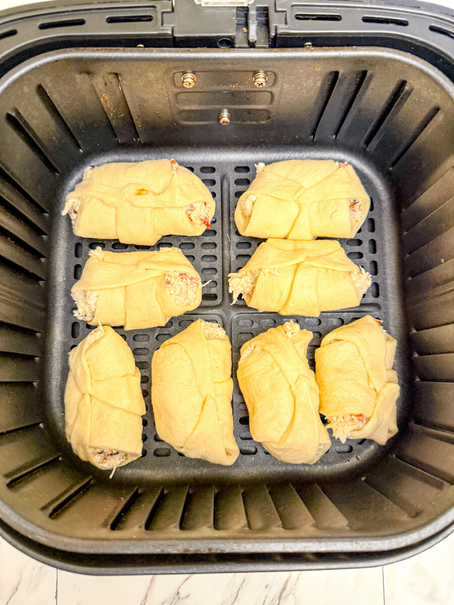 Chicken Crescent Rolls in air fryer basket